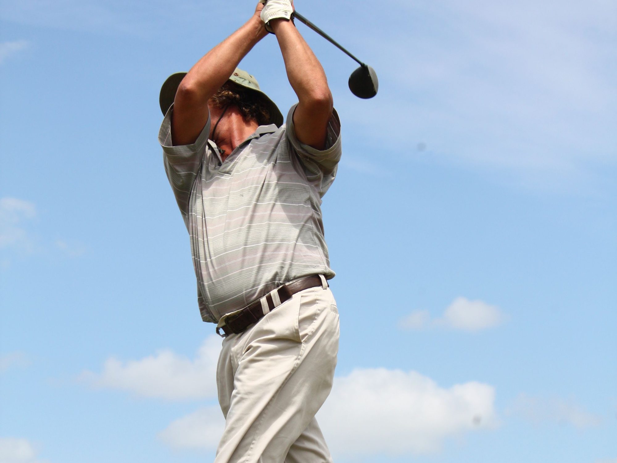 Lesson on the driving range with an instructor